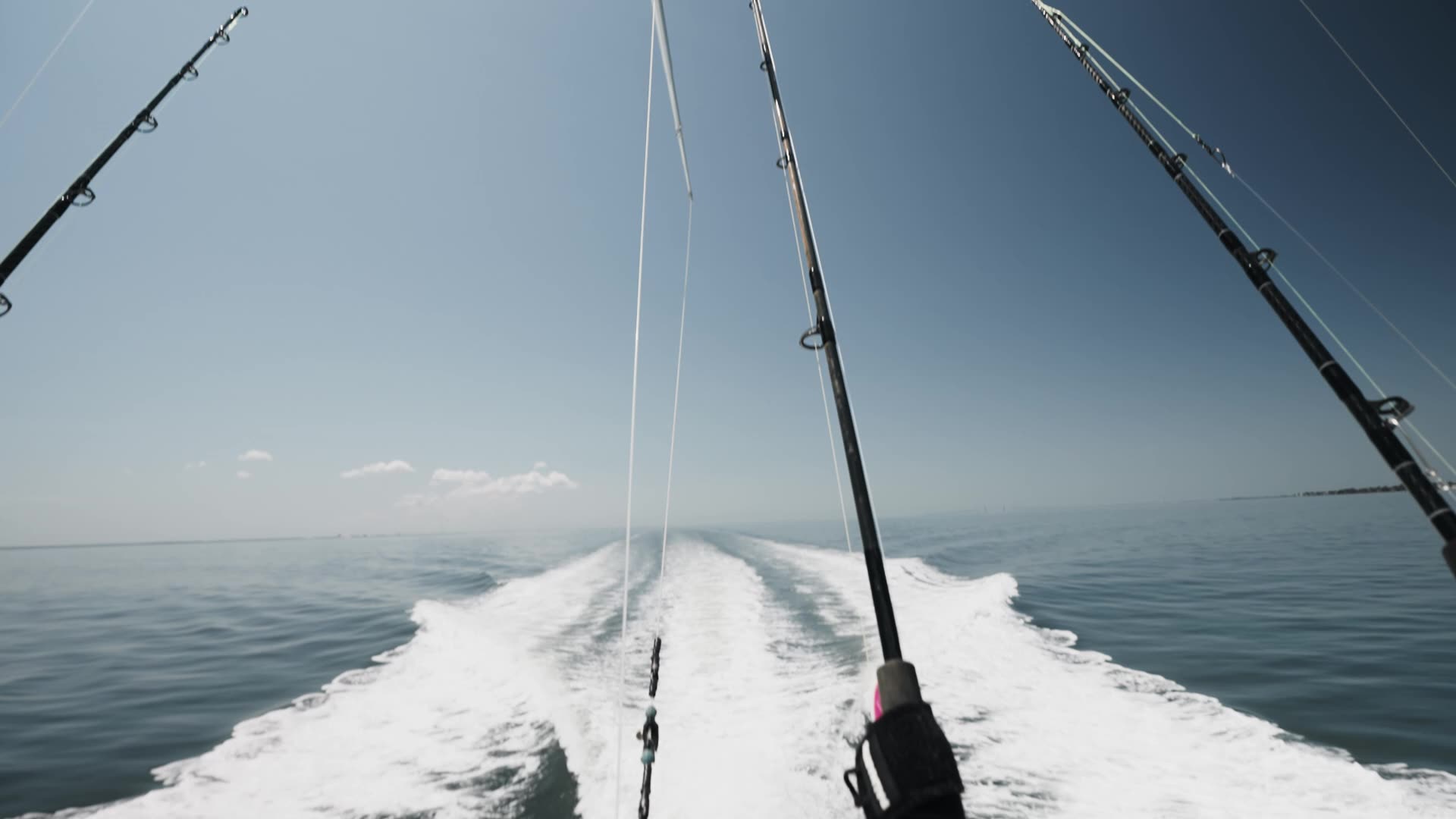 Mjolnir's wake offshore, with the outrigger lines set