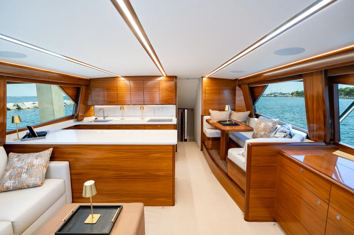 The salon looking forward, with the settee and the stairs up to the flybridge